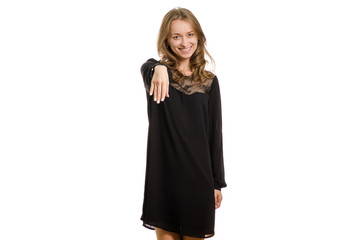 Fototapeta premium Girl in a black dress man kisses a woman's hand