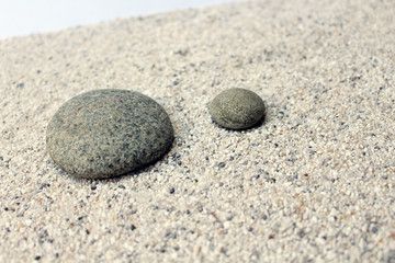 Fototapeta na wymiar Steine auf Sand