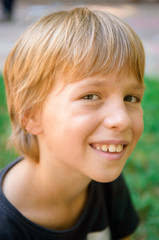 portrait of little boy outdoors