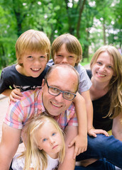 family with boys and girl