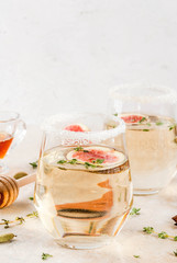 Fall cold sweet white wine cocktail with fig, plum, honey and thyme, copy space
