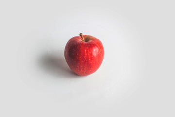 close-up view of fresh red apple on a white background