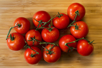 Vine Ripe Tomatoes on a Bamboo Background