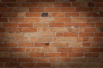 Red brick wall with vignette background texture