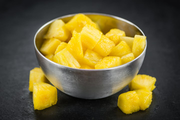 Sliced Pineapple on a slate slab, selective focus