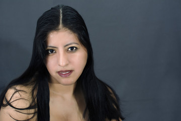 A BEAUTIFUL LATIN WOMAN WITH SMILEY FACE