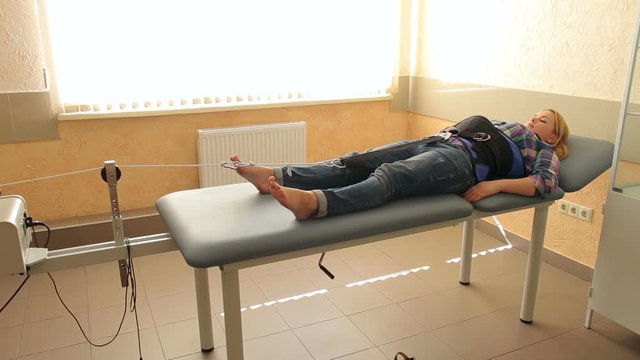 Traction spine traction in the physiotherapy room. Rehabilitation. Treatment and recovery of the spine in a specialized clinic.