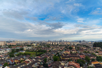 A cloudy day in Kuala Lumpur, the capital of Malaysia. Its modern skyline is dominated by the 451m tall KLCC, a pair of glass and steel clad skyscrapers.