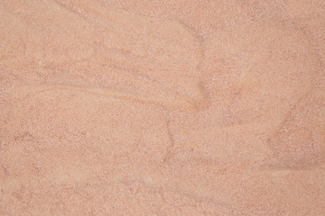 Smooth sandy background texture.