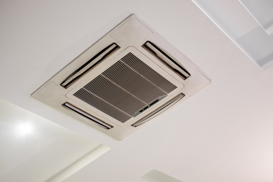 Ceiling air conditioner, on white ceiling
