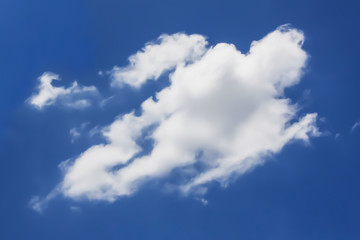 Dramatic beautiful form of blue sky and clouds.Form of cloud look like flying robot.