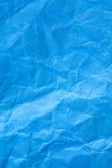 Texture crumpled blue paper background.