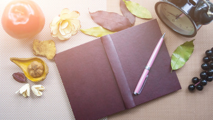 Notepad, pen, fruit, spices. Still life. The concept of the book for recipes