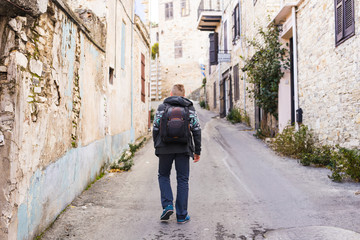 Obraz na płótnie Canvas Hiker walks alone. Travel and adventures concept.
