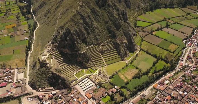 Ollantaytambo Peru Aerial v6 Birdseye view flying over small town panning