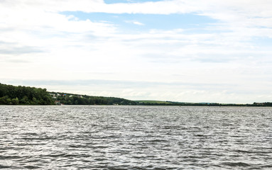 Not a calm lake in a cloudy weather.