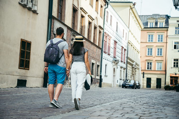 man with woman walking outside