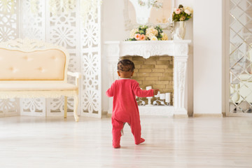 Cute little boy at home. Mixed race child.