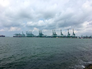 View on Singapore harbour and cranes
