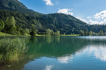 Naklejka na ściany i meble The mountain lake in Alps, Austria