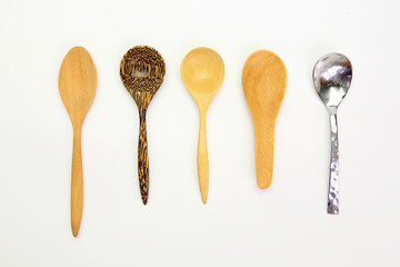 Many kind spoon on white background.