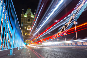 Fototapeta na wymiar Traffic light trails along Tower Bridge in London. UK