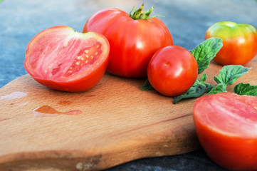 Yellow and red tomatoes on the board