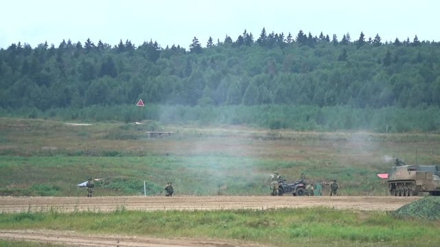 Slow motion video of Russian special forces shooting and evacuation in armored personnel carrier