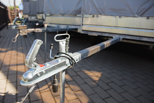 Automobile trailers are in a row