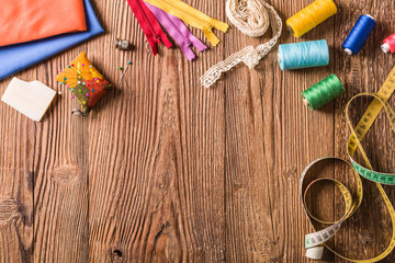 Tailor accessories. Concept. Natural wooden background.