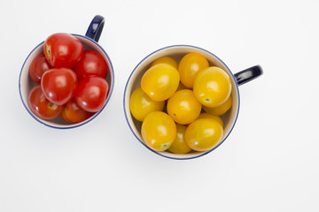 Top view cherry tomatoes in white cup