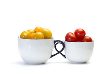 Cherry tomatoes in white cup