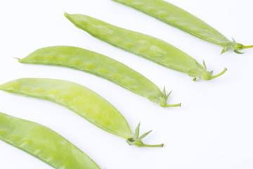 Snow peas isolated on white background.