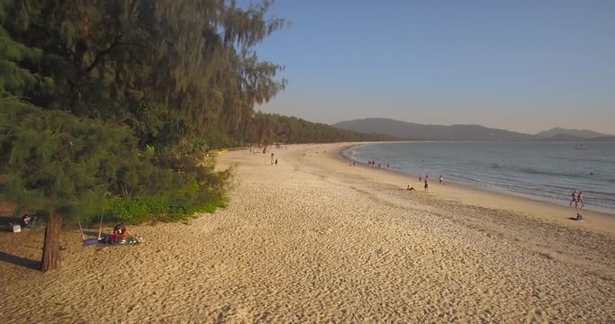 Unspoilt Beach And Pine Trees At Layan, Phuket, Thailand, Aerial Slider Shot
