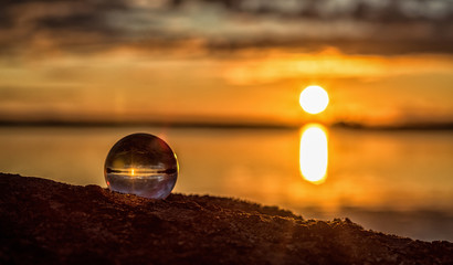 Summer lake sunset with crystal ball view