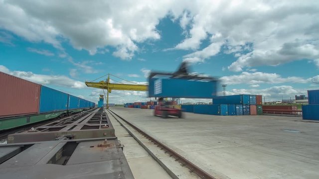 Timelapse Gantry Crane Unloads Containers from Train