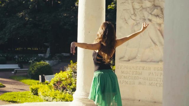 Young couple dancing in the park