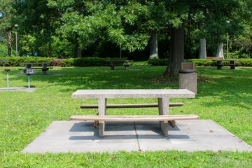 The concrete picnic table at the park.