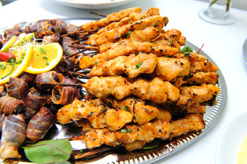 Chicken and stuffed dates with bacon
