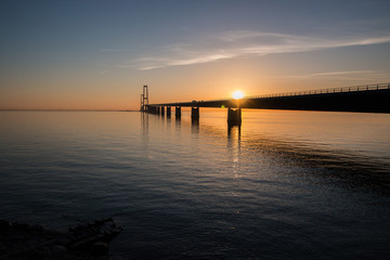 Fototapeta na wymiar Storebæltsbroen at sunset - Korsør, Denmark