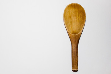  scoop of rice placed on a white background