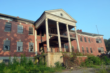 Fototapeta na wymiar Old Abandoned School Building 