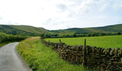 Fototapeta na wymiar A country road in the English Peak District.
