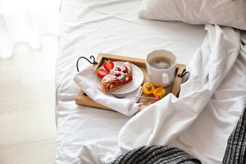 Delicious breakfast on bed