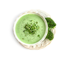 Bowl with tasty broccoli soup on white background