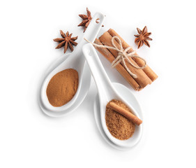 Composition with sweet cinnamon sugar on white background