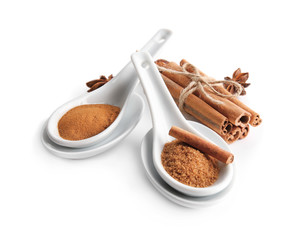 Composition with sweet cinnamon sugar on white background