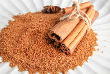 Plate with sweet cinnamon sugar, closeup
