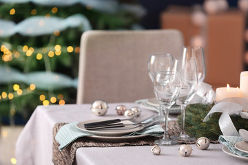 Table served for Christmas dinner in living room