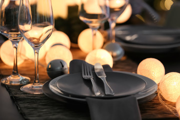 Table served for Christmas dinner in living room